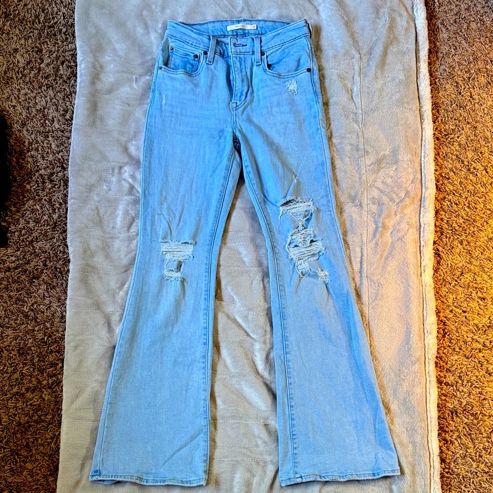 Women's Light Blue Distressed Jeans